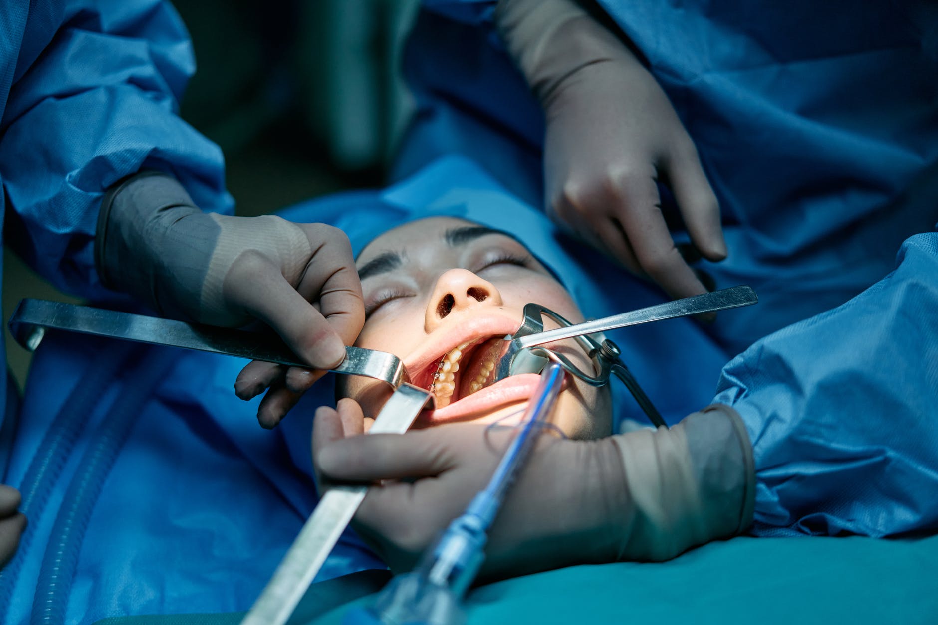 a woman patient getting dental treatment