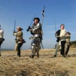 photo of men holding weapons