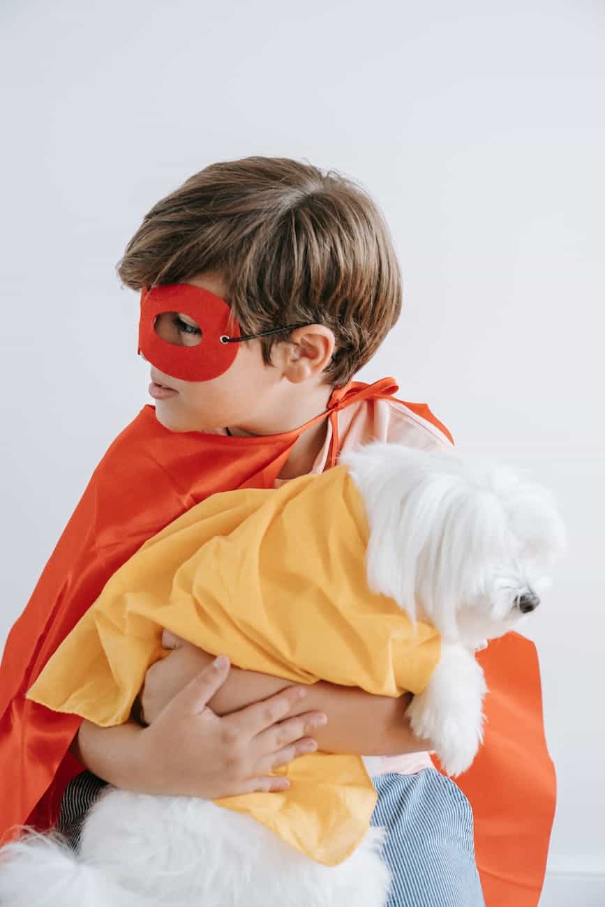 boy and a dog wearing costume