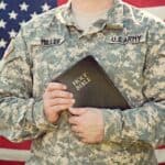 man holding bible